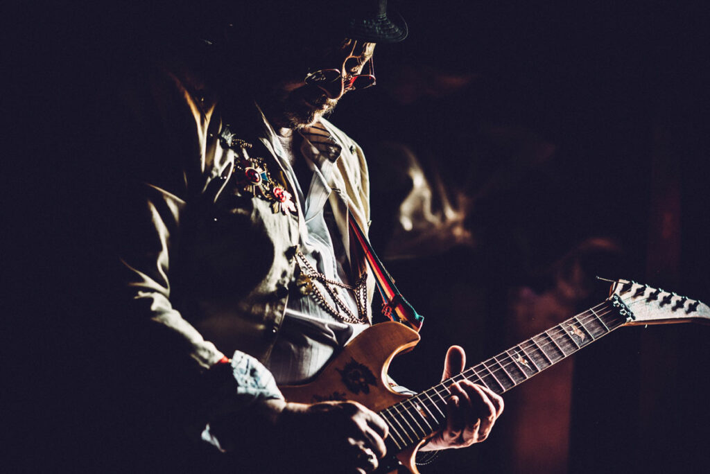 man playing a guitar